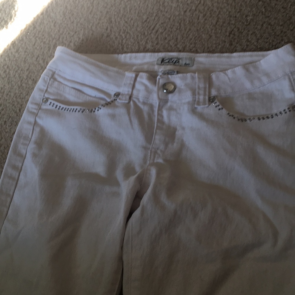 white jeans with bejeweled pockets front and back